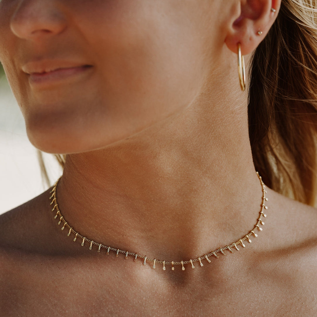 Chic silver minimalist choker necklace for women. Elegant adjustable jewelry, a subtle fashion statement.