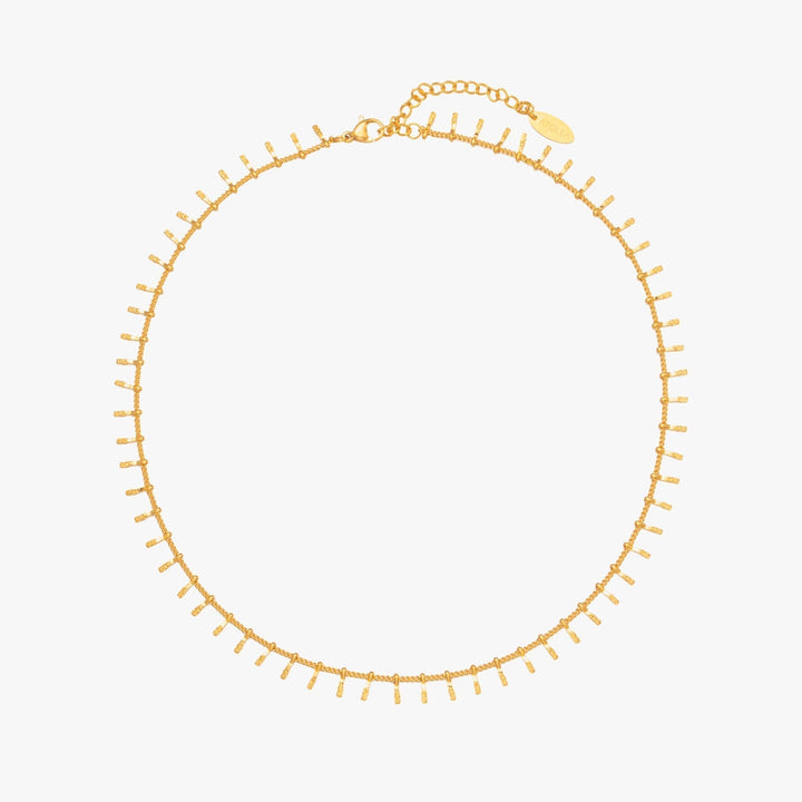 Adjustable minimalist choker necklace, available in gold & silver. Versatile elegant jewelry for women.