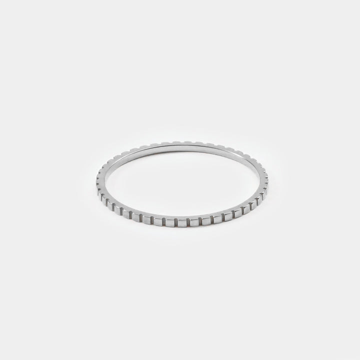 Simple gold thin band ring, versatile minimalist jewelry for women. Delicate, stackable fashion accessory.