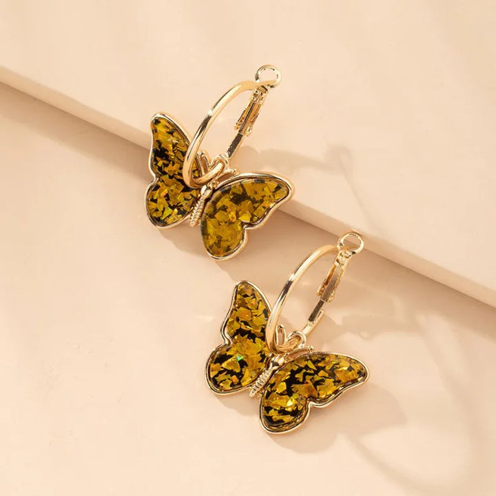 Elegant gold plated butterfly earrings with sparkling acrylic crystals. Delicate women's fashion jewelry, perfect gift for her.