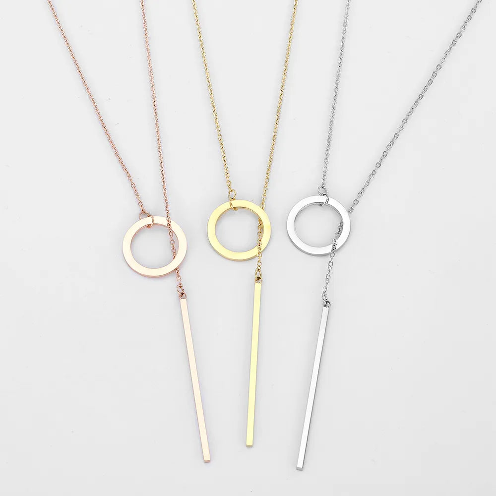 Women's Elegant Gold Drop Bar Lariat Necklace. Versatile, dainty, and gold plated jewelry.