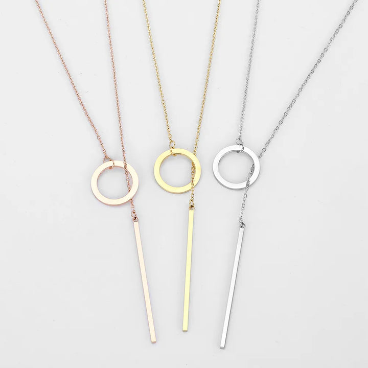 Women's Elegant Gold Drop Bar Lariat Necklace. Versatile, dainty, and gold plated jewelry.