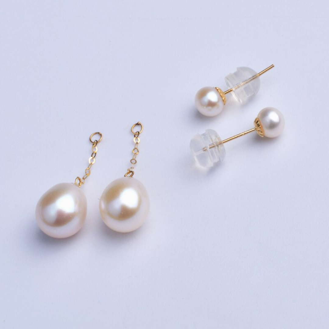 Women's classic fashion accessory: Gold-plated drop earrings adorned with radiant pearls, perfect for gifting.