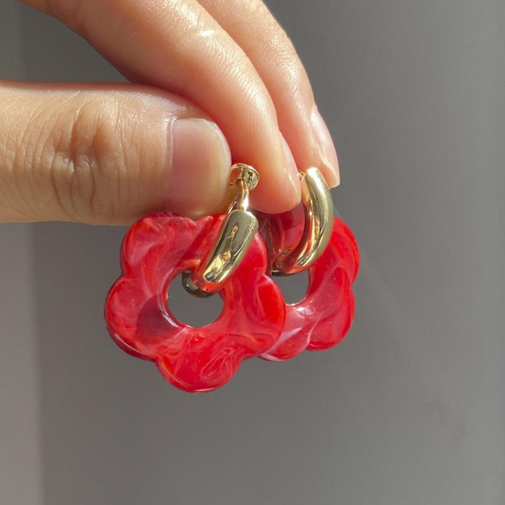 Pair of gold plated flower earrings, hypoallergenic and perfect for gifting.