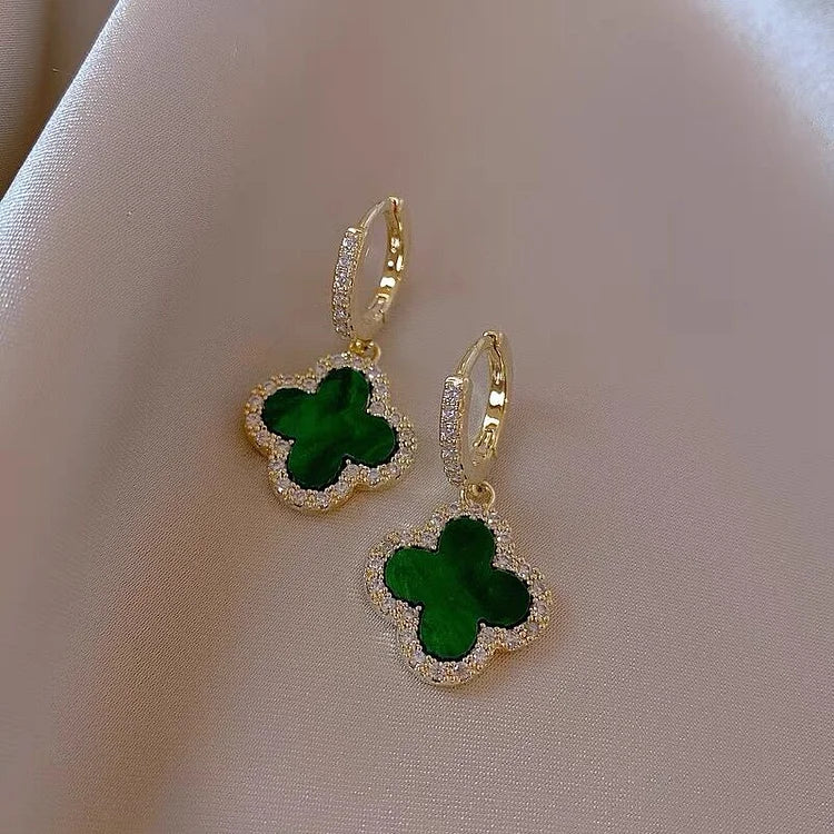 Lucky four leaf clover drop earrings for women, perfect symbolic jewelry for everyday wear or as a gift.
