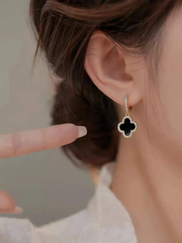 Beautiful four leaf clover lucky earrings, an ideal gift for her and a symbolic piece of women's jewelry.