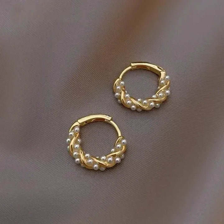 Elegant gold-plated pearl hoop earrings for women. Timeless classic style, versatile for everyday wear or special occasions.