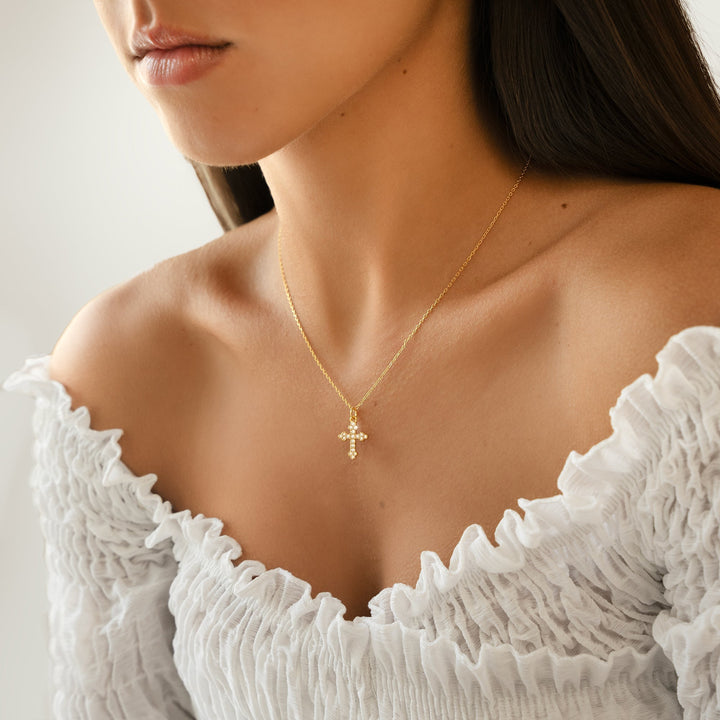 Clémence elegant gold plated sterling silver cross necklace for women, spiritual and adjustable.