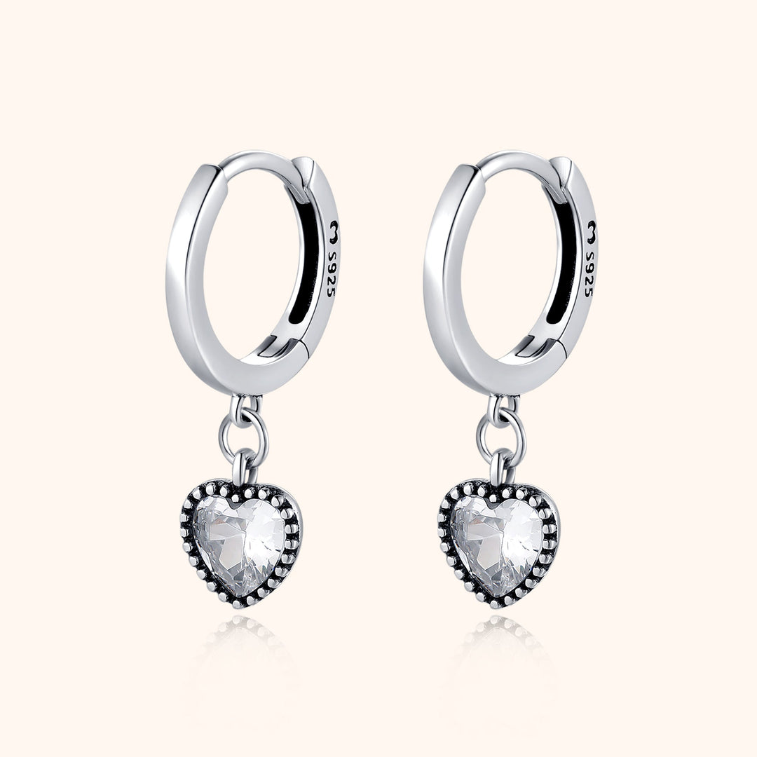 Elegant gold plated sterling silver crystal heart drop earrings for women. A perfect romantic gift.