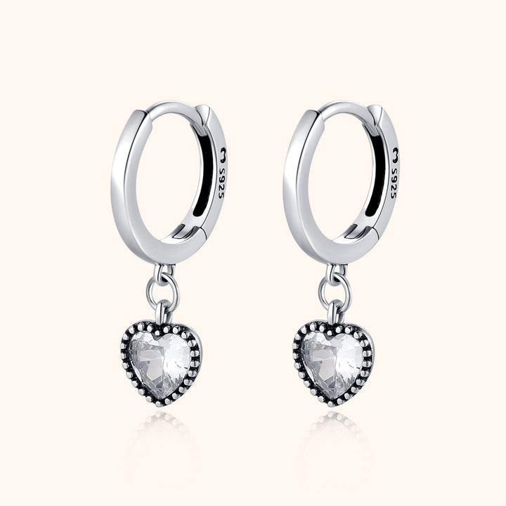 Elegant gold plated sterling silver crystal heart drop earrings for women. A perfect romantic gift.