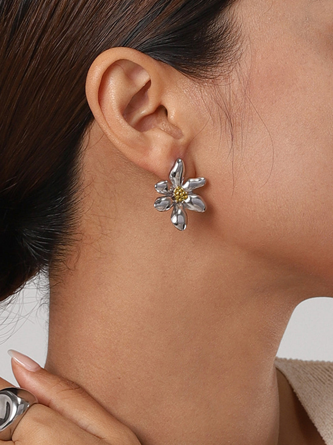 Florina collection silver tone flower earrings, a trendy fashion accessory.