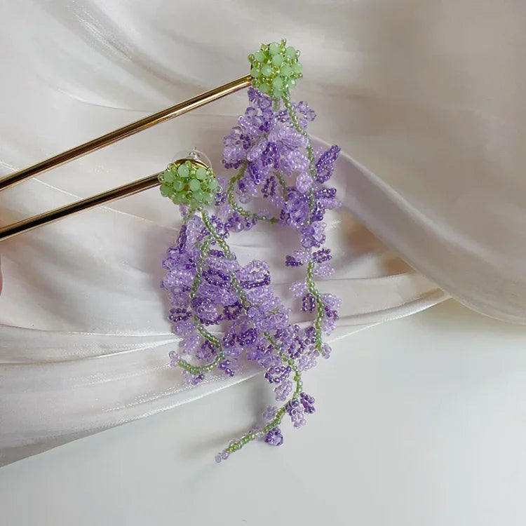 Artistic gold-plated wisteria cluster earrings for women, elegant nature-inspired jewelry with a delicate forest theme.