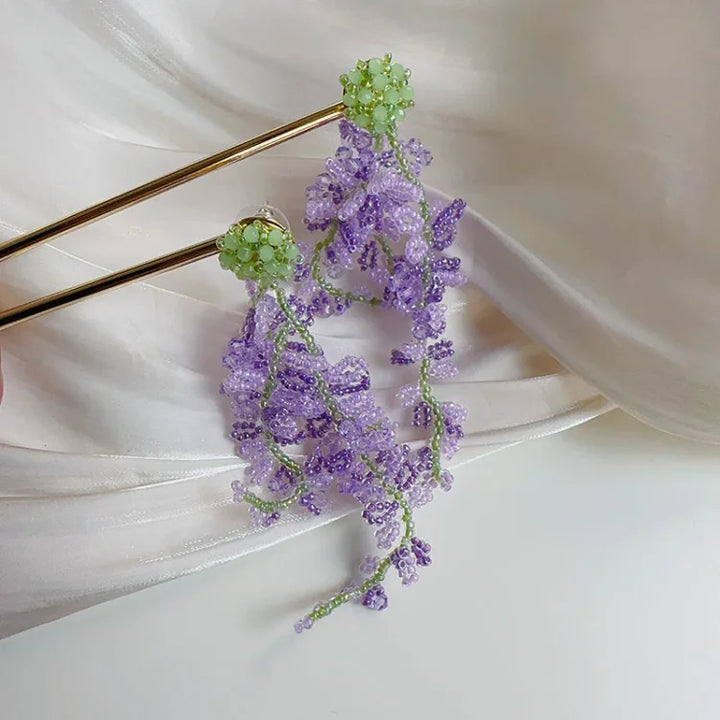 Artistic gold-plated wisteria cluster earrings for women, elegant nature-inspired jewelry with a delicate forest theme.