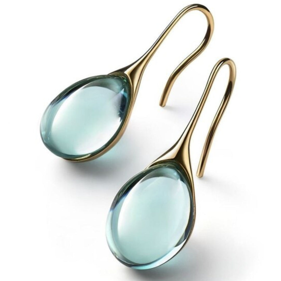 Elegant gold-plated women's crystal drop earrings. Versatile fashion dangle earrings, a perfect gift for her.