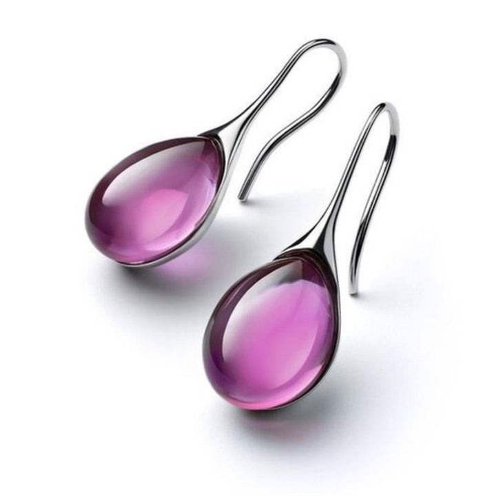 Versatile women's crystal drop earrings. Elegant dangle earrings, gold-plated fashion jewelry, an ideal gift.