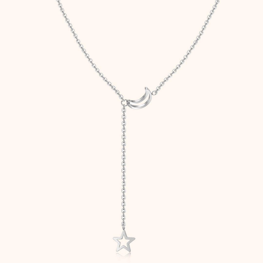 Delicate women's gold plated celestial necklace with shimmering star & moon charms, ideal elegant silver jewelry.