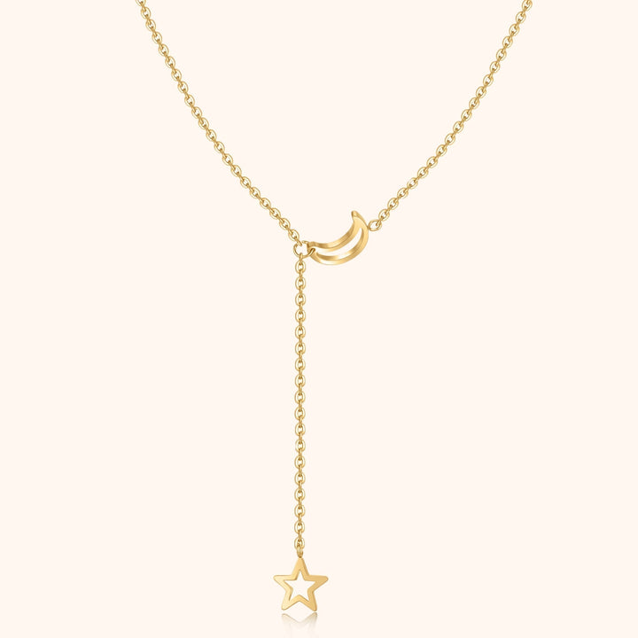 Sparkling women's gold plated star & moon celestial necklace, an elegant accessory, perfect gift for her.