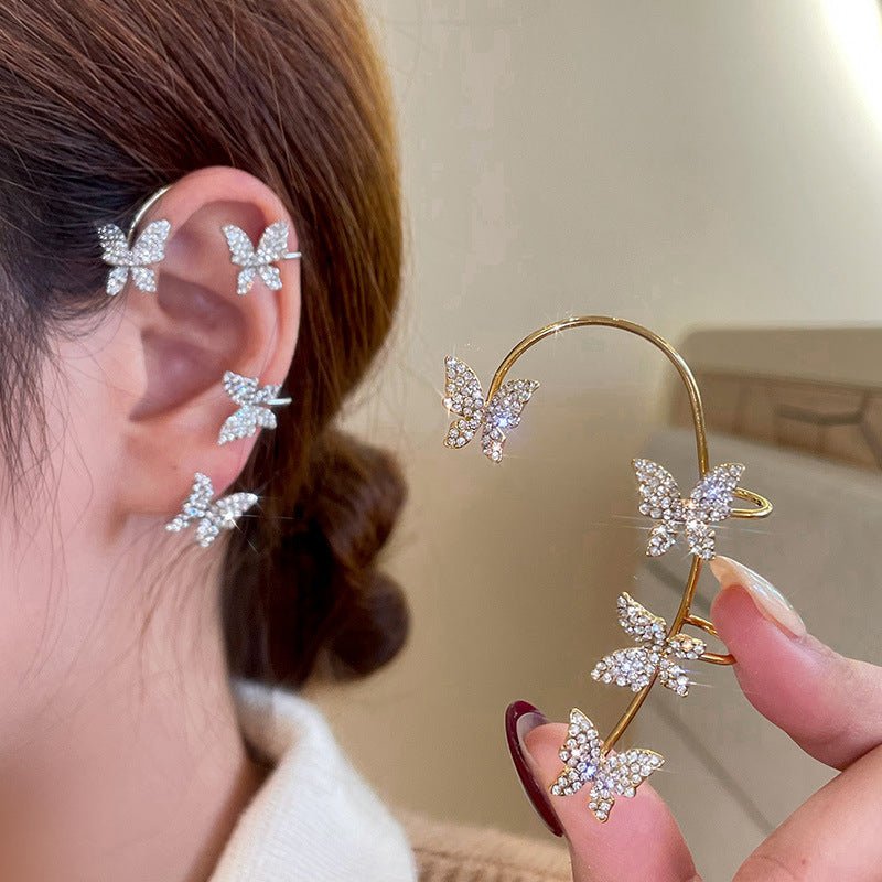 Chic gold-tone leaf clip earrings. Elegant, adjustable non-pierced women's jewelry for a sophisticated look.