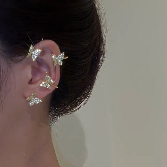 Elegant gold-tone statement clip-on earrings. Adjustable design provides no-piercing style for modern women.