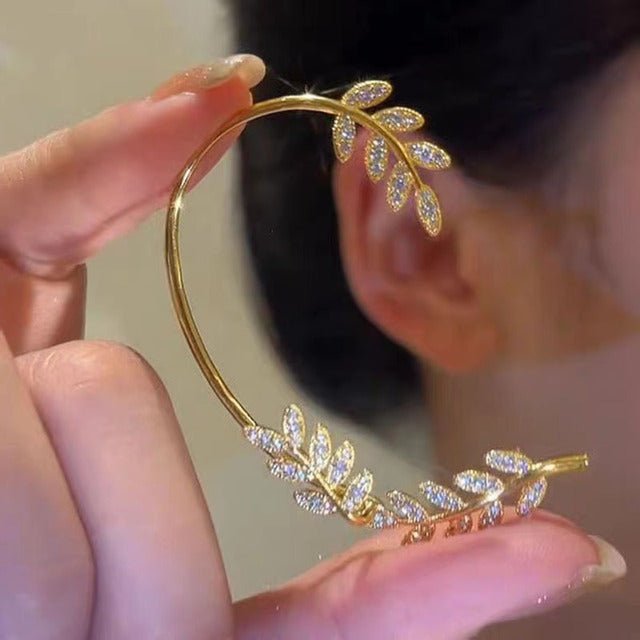Delicate silver-tone leaf clip earrings. Adjustable non-pierced design, ideal for an elegant, everyday look.