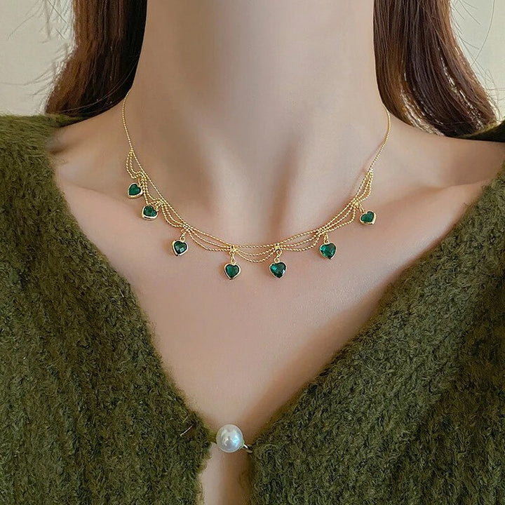Adjustable gold tone heart necklace for women. Elegant stainless steel jewelry, a romantic fashion accessory.