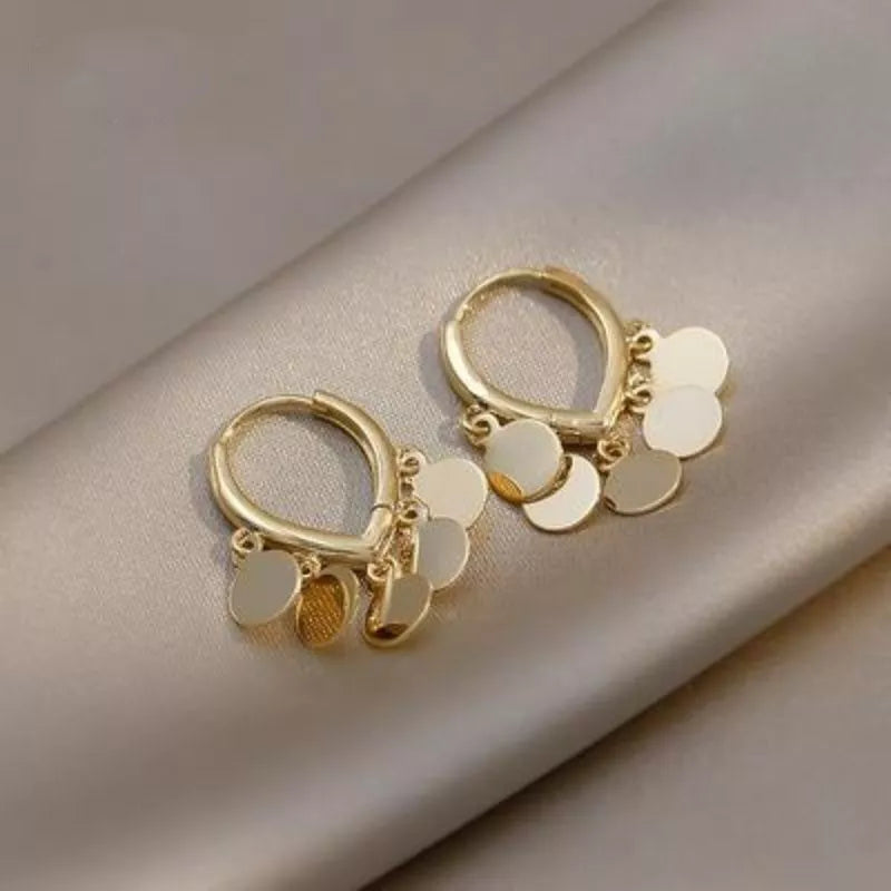 Stylish gold & silver plated boho hoop earrings. Trendy women's bohemian fashion accessory jewelry.