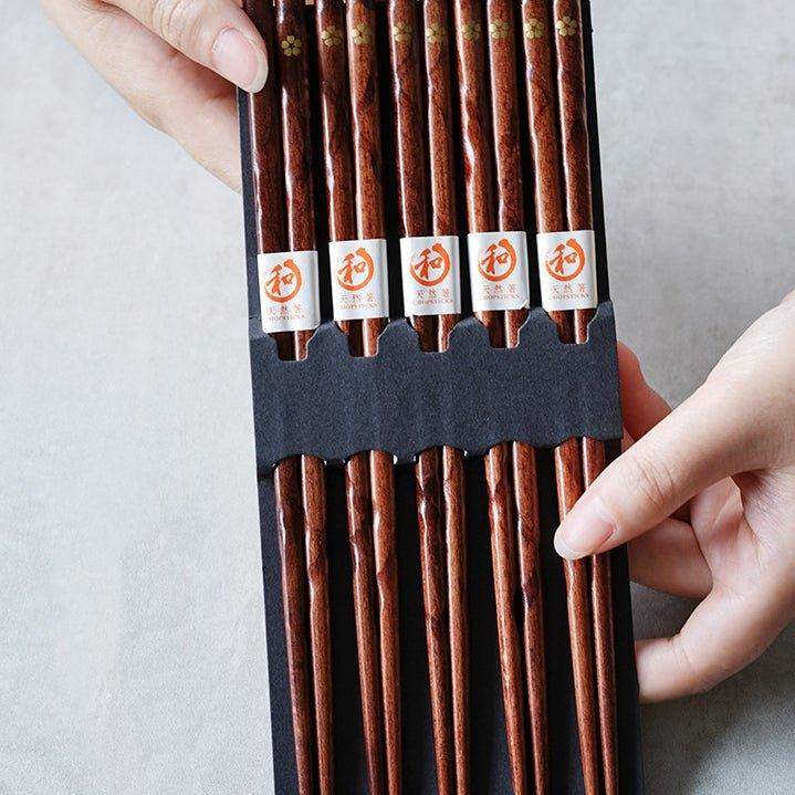 Stylish & functional wood chopsticks, 5 pairs with golden cherry blossom for elegant Japanese meals and kitchen.