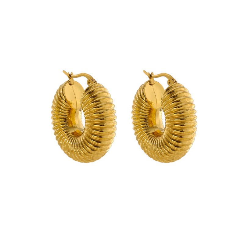 Elegant golden earrings for women. Delicate, hypoallergenic everyday wear jewelry. Perfect fashion accessory.