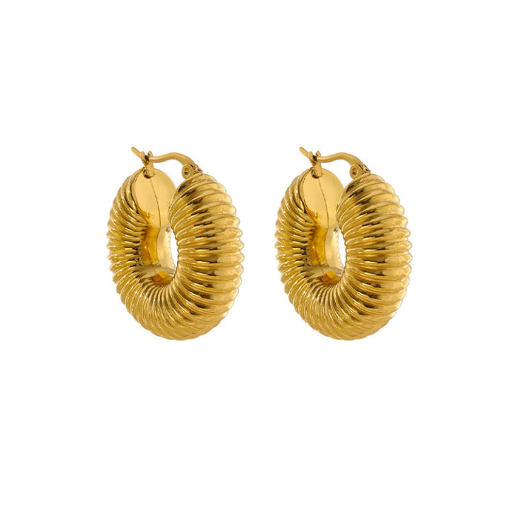 Elegant golden earrings for women. Delicate, hypoallergenic everyday wear jewelry. Perfect fashion accessory.