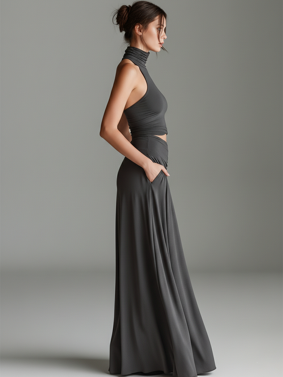 Flowing gray elegant maxi dress for women. Halter neck, stylish cutout, and a beautiful ruched skirt create a flattering silhouette.
