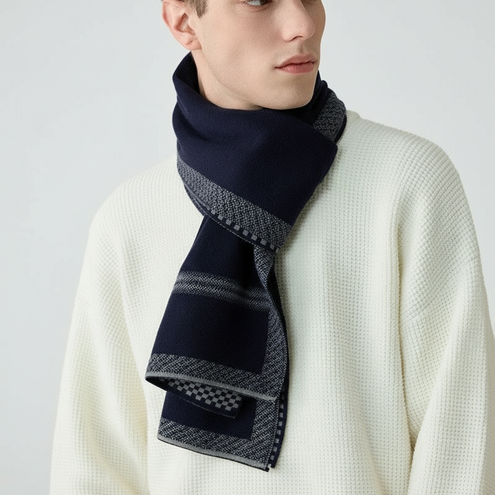 Closeup of a soft, fine cashmere men's scarf, showing its luxurious texture, great for winter warmth.