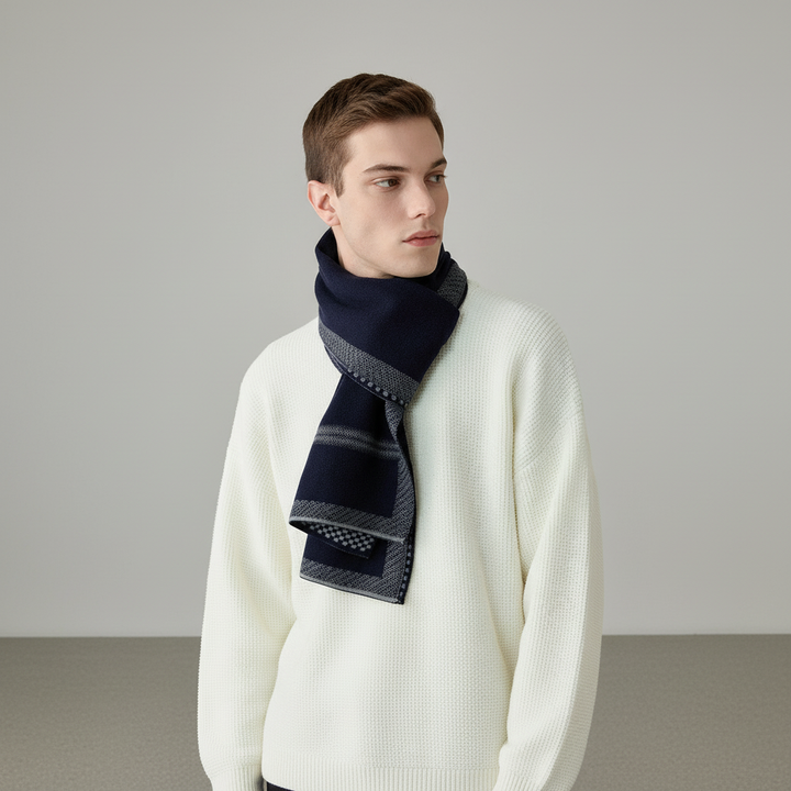 Folded blue men's cashmere scarf, a cozy and warm winter accessory, ideal for a refined look.