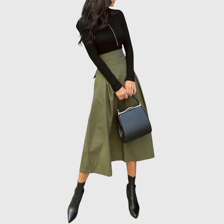 Elegant green A-line midi skirt for women. Versatile style, perfect for chic office wear or sophisticated casual outfits.