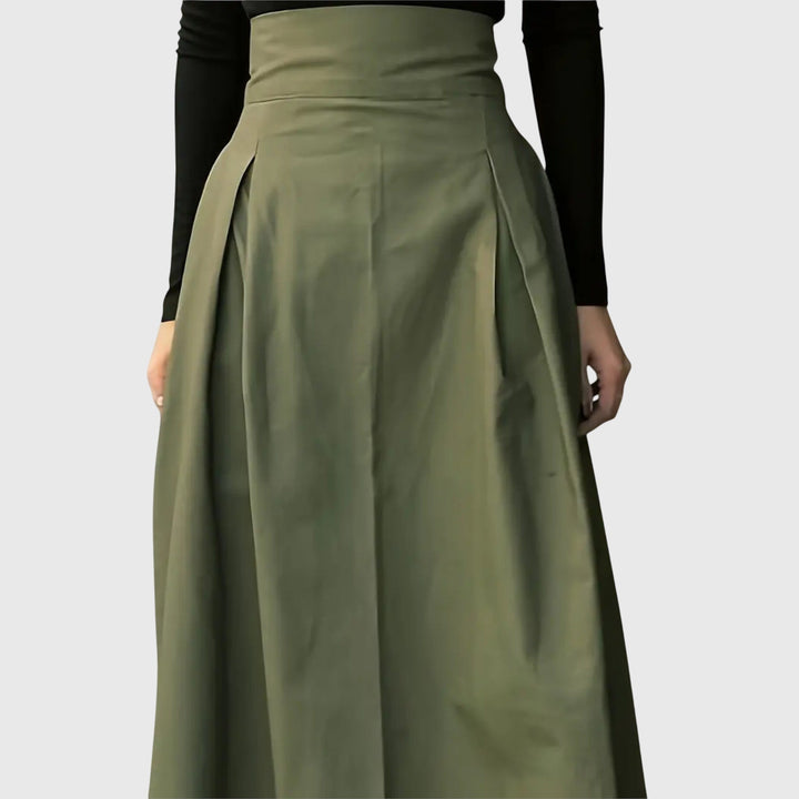 Chic green A-line midi skirt for women, offering elegant style for versatile office wear and fashionable casual looks.