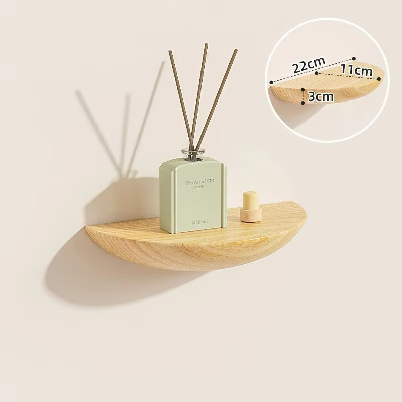 Space-saving half-round floating wall shelf offers functional storage & minimalist accent decor.