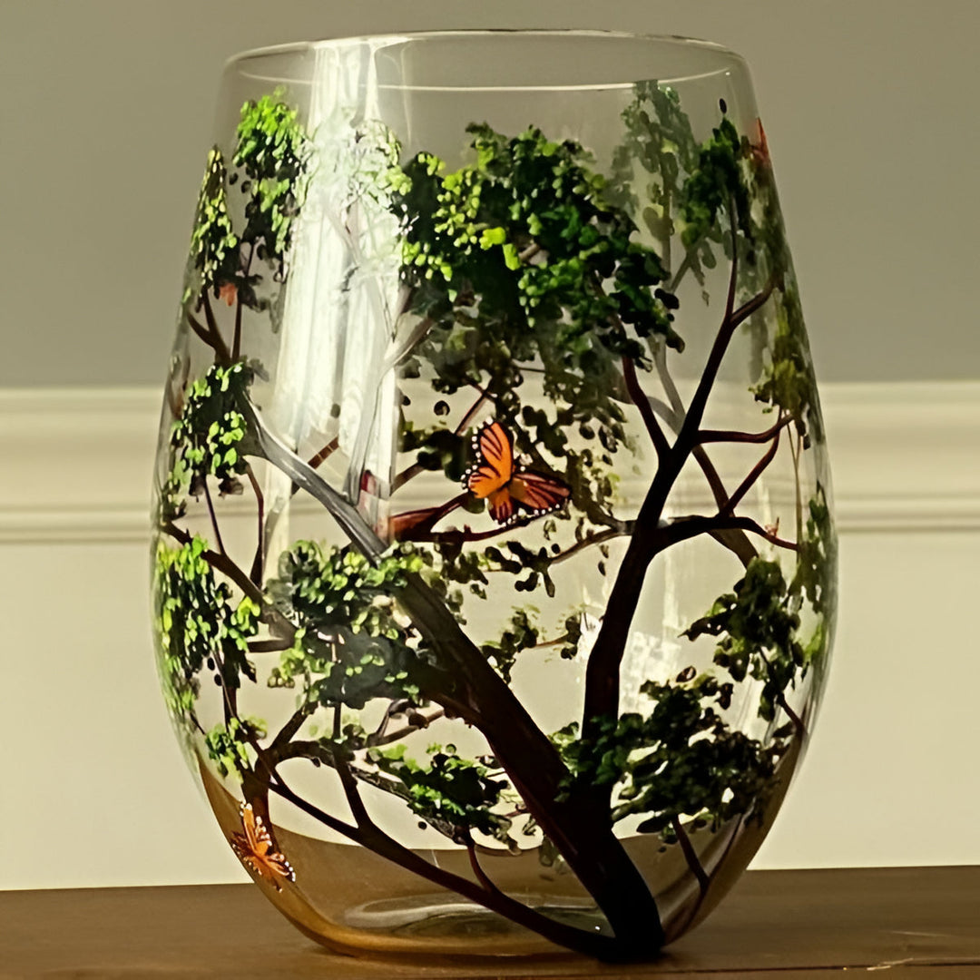 Artisan Four Seasons Tree design on stemmed wine glasses, beautiful hand painted art glass.