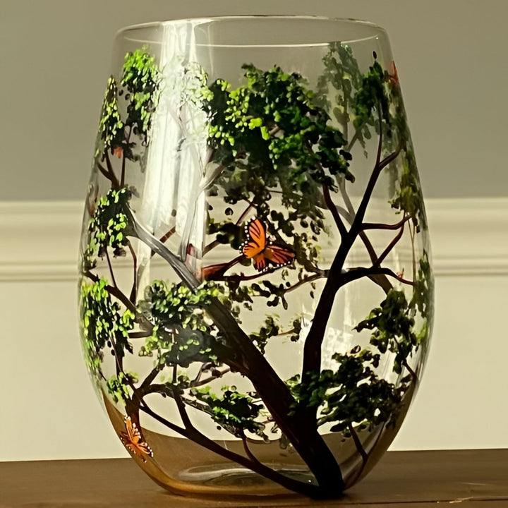 Artisan Four Seasons Tree design on stemmed wine glasses, beautiful hand painted art glass.