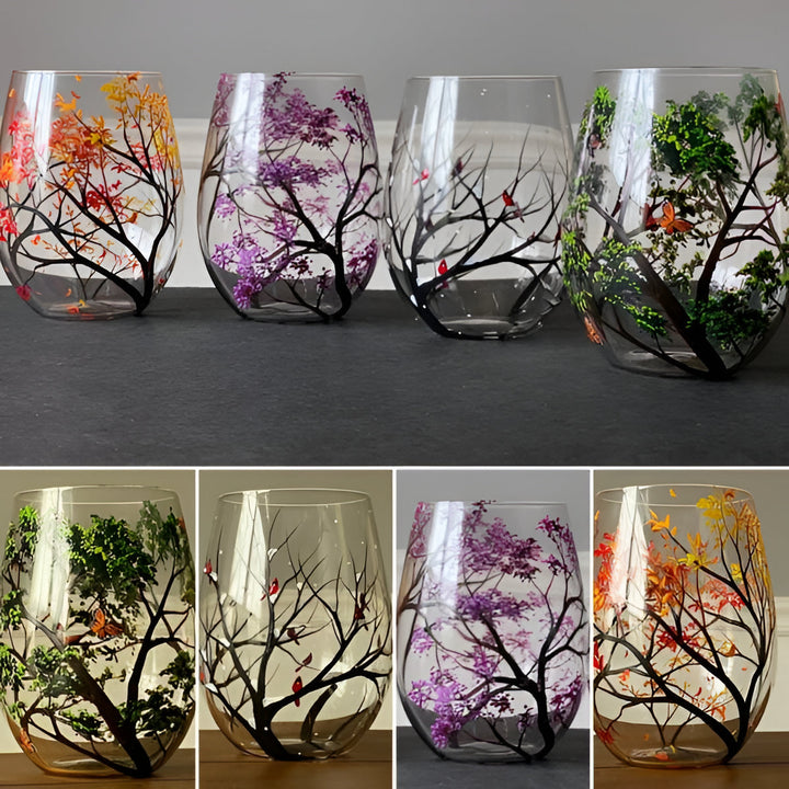 Beautiful hand painted Four Seasons Tree wine glasses, artisan art glass for home decor.