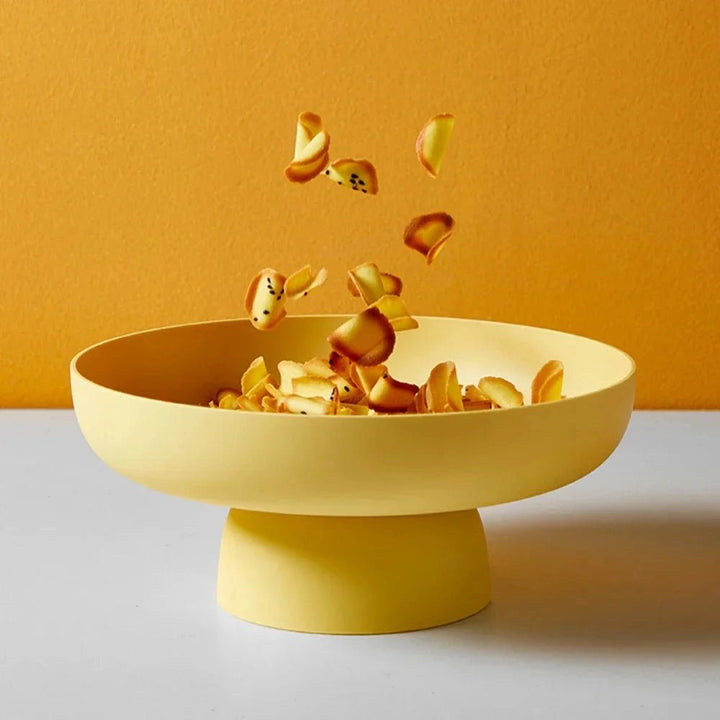 Detail of unique hand-painted design on a decorative fruit bowl, perfect kitchen accent.