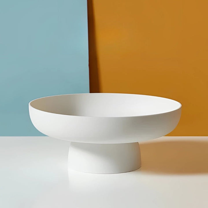 High-angle view of a chic hand-painted fruit bowl, perfect for modern kitchen storage or decor.