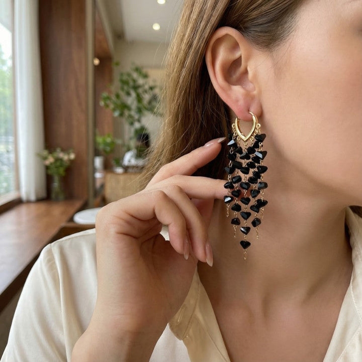 Elegant irregular crystal tassel dangle earrings for women, perfect for parties & glamour fashion.