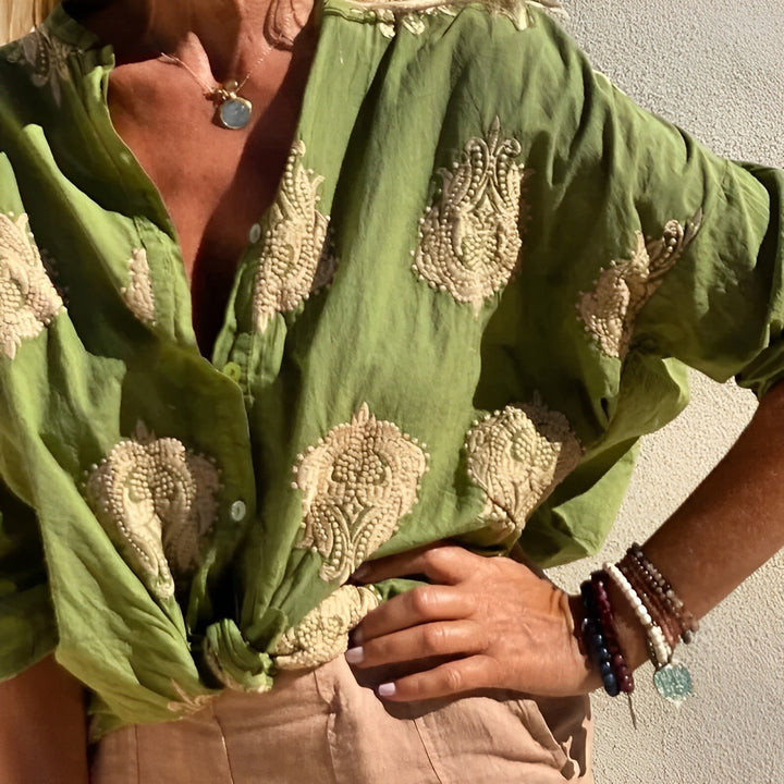 Trendy Isabelle ladies apparel, an elegant top for women featuring a sophisticated design.