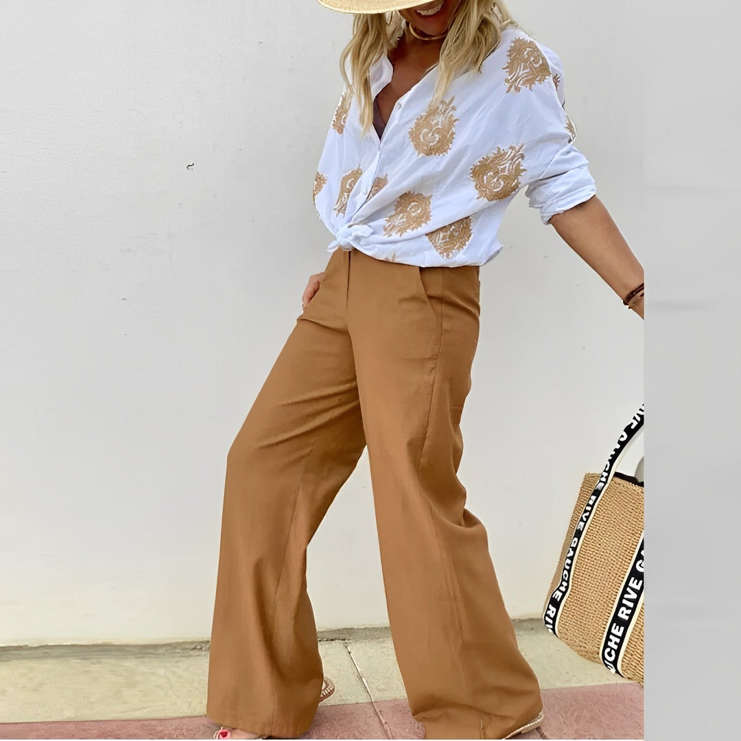 Elegant Isabelle women's tailored blouse, a trendy and chic top for various occasions.