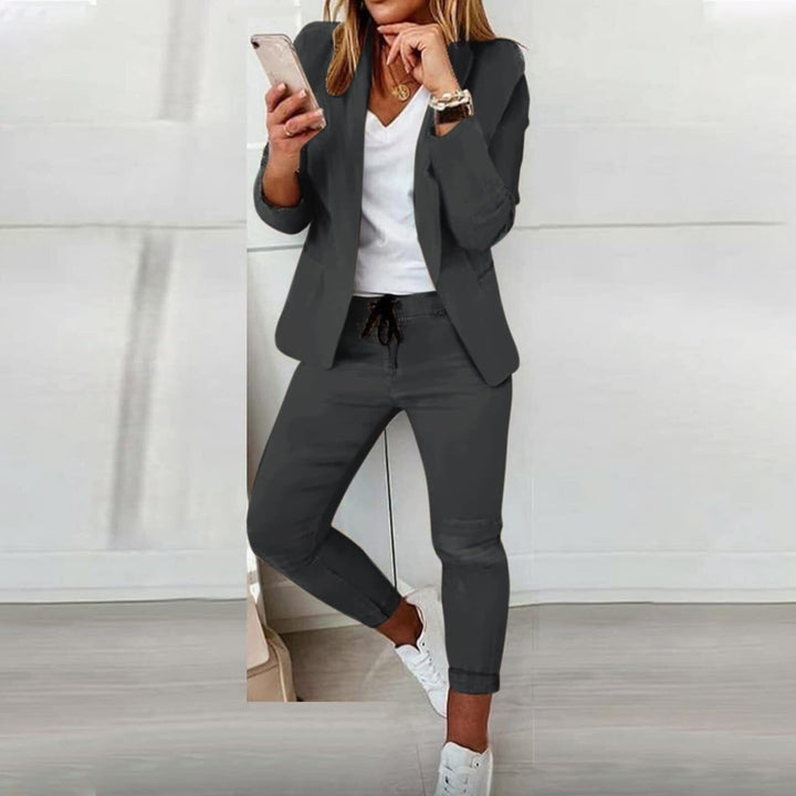 Stylish Isabelle women's two-piece suit. Elegant blazer & trousers provide a professional & casual chic look.