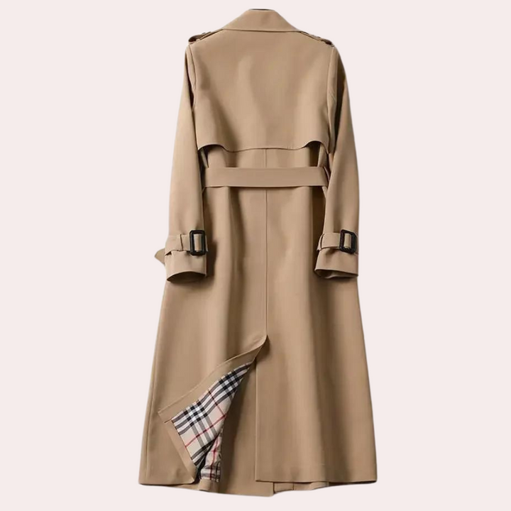 Classic black double button tailored long coat for women. Sophisticated fall & winter formal wear.