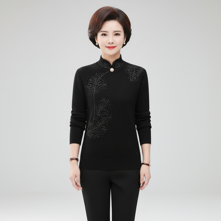 Women's high collar knitted sweater, autumnal floral design, luxurious wool blend, perfect for winter fashion.