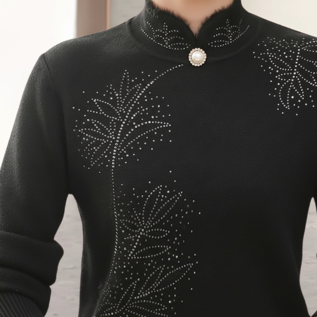 Close-up of elegant women's high collar knitted sweater, intricate floral pattern on soft wool blend fabric.