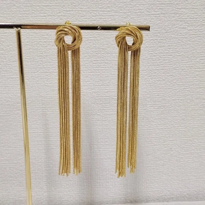 Stylish women's elegant knot long tassel earrings, versatile for both casual and formal wear.