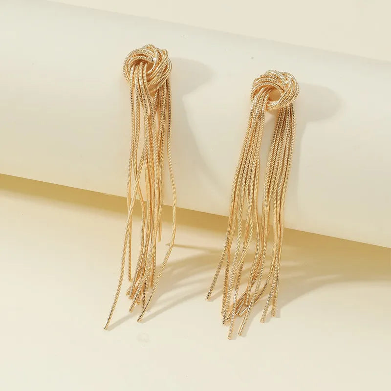 Delicate knot long tassel earrings, a luxurious women's jewelry item that catches the eye.
