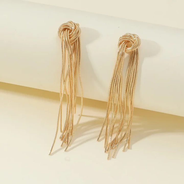 Delicate knot long tassel earrings, a luxurious women's jewelry item that catches the eye.